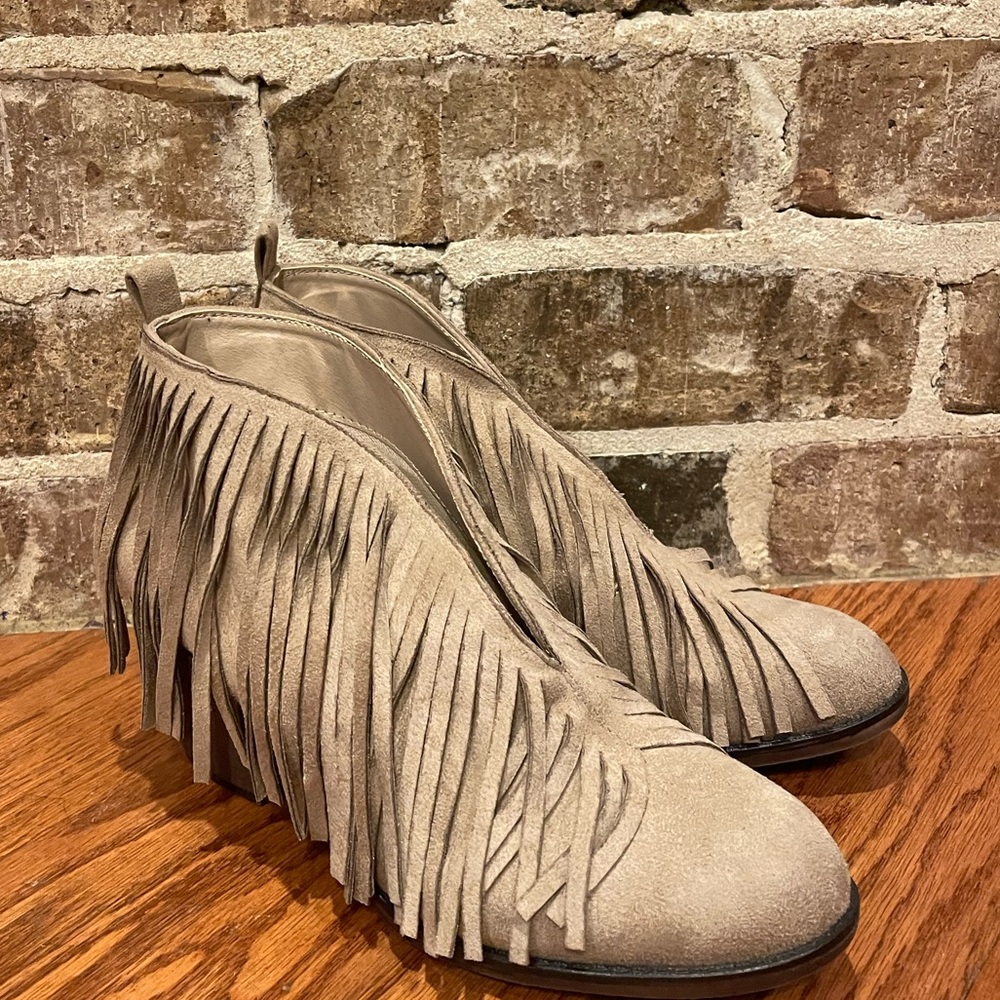 Women’s fringe booties.